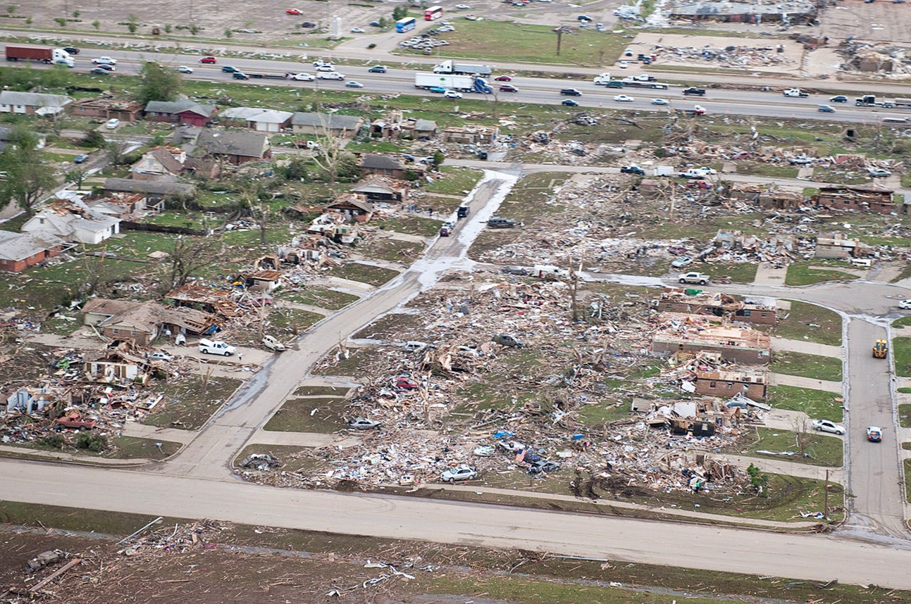 arial photo of town devestated by tornado