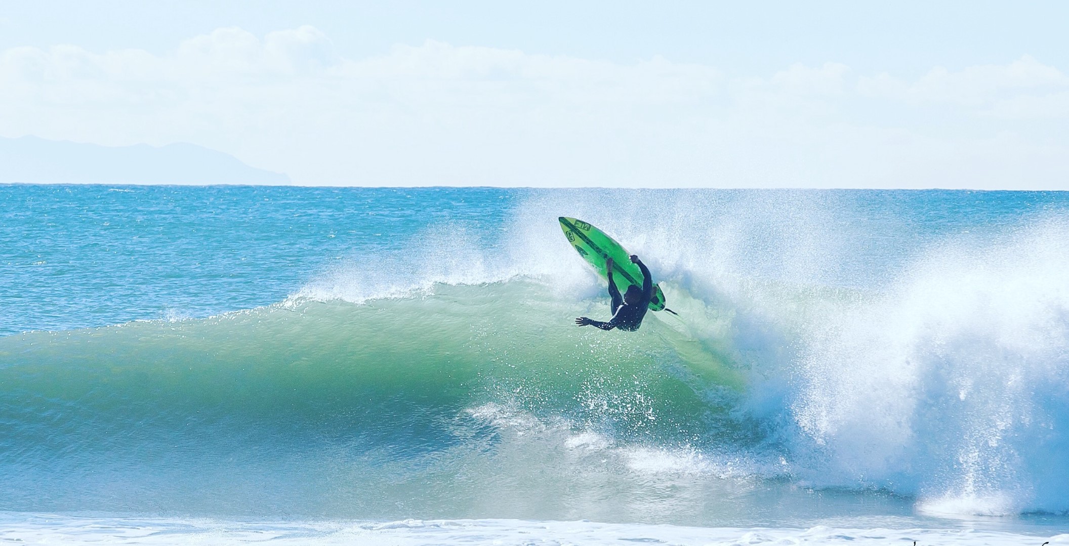 Surfing near Topanga, California.