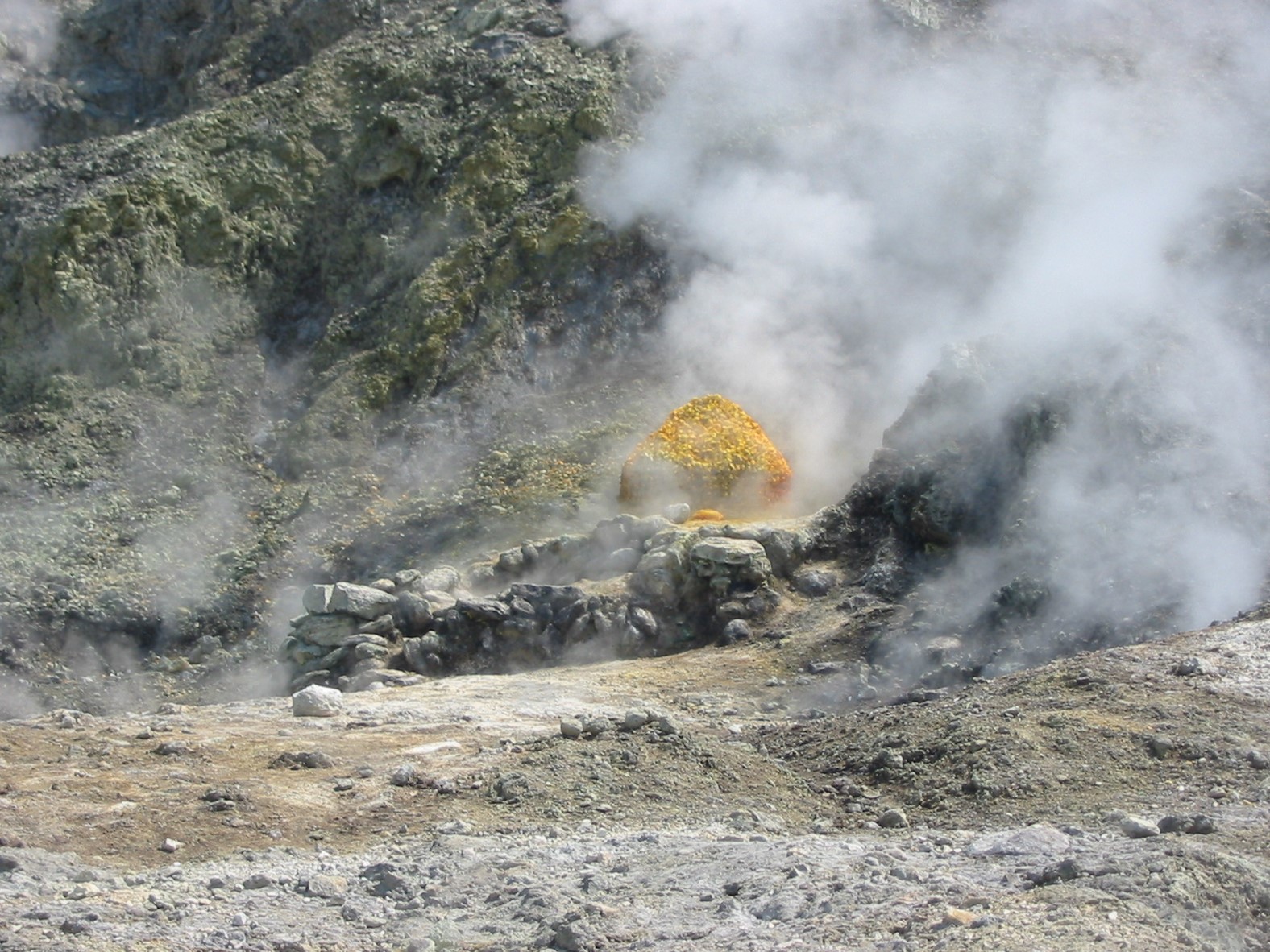 Sulfur deposits near an active fumarole within the Solfatara crater in 2003