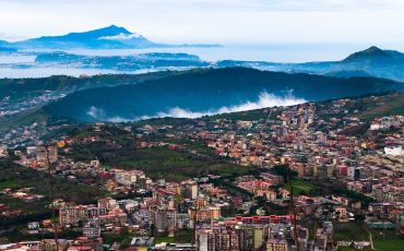 The Astroni volcanic crater includes a regional park surrounded by suburban neighborhoods