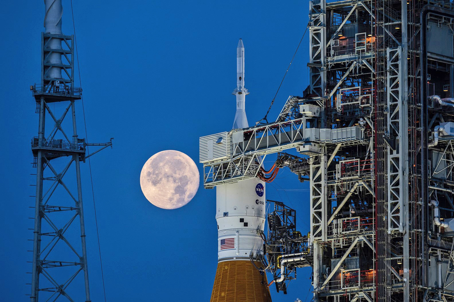 A full moon is in view from Launch Complex 39B at NASA’s Kennedy Space Center
