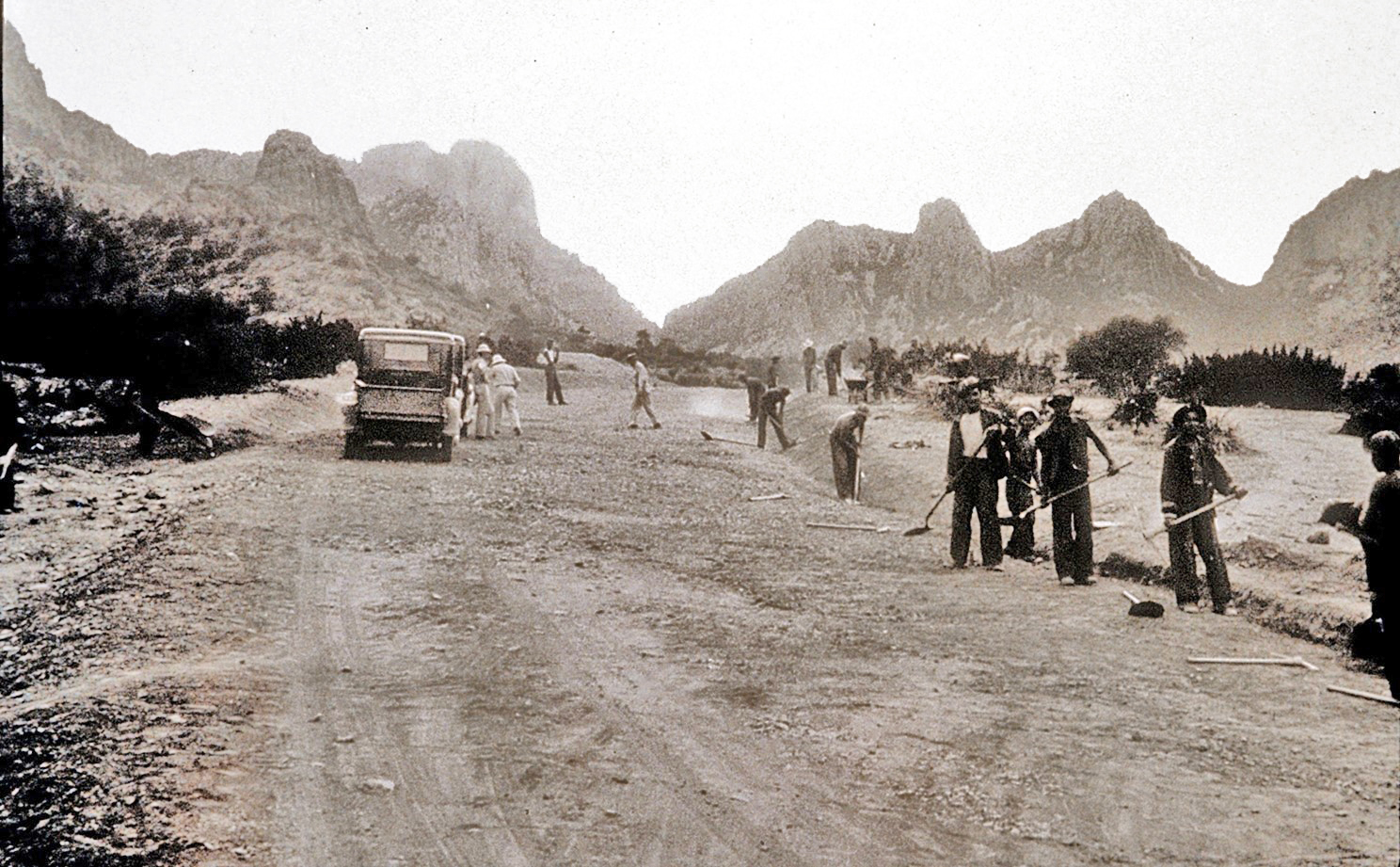 Civilian Conservation Corps work crew constructing the road