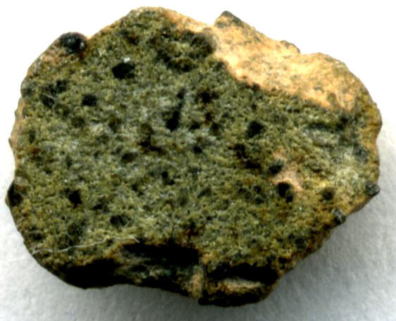 Another example of shergottite, NWA  2373, contains mostly olivine, pigeonite, and augite pyroxene along with the smaller amounts of glassy maskelynite.
