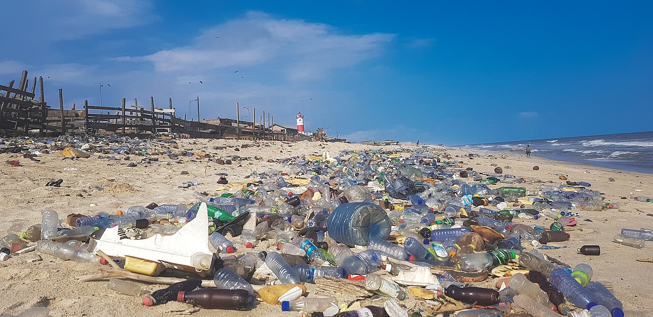 Plastic pollution covering Accra beach in Ghana.