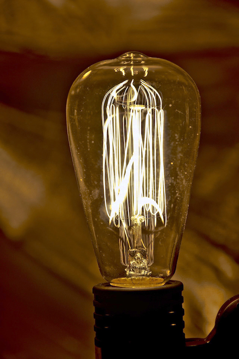 The “Edison bulb,” a reproduction made to look like Thomas Edison’s original light bulbs