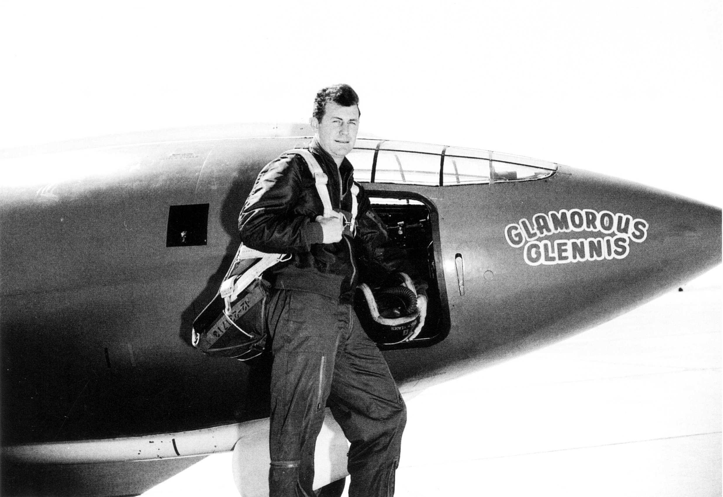 Chuck Yeager next to experimental aircraft