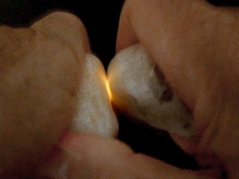 two quartz pebbles rubbed together